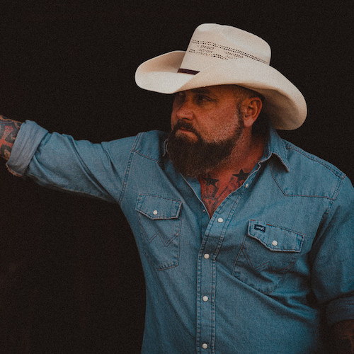 Out Now: Outlaw Country Troubadour Creed Fisher Pays Homage To Blue Collar America, Country Life & Bocephus Himself On New Music Video For  “Hank Williams”
